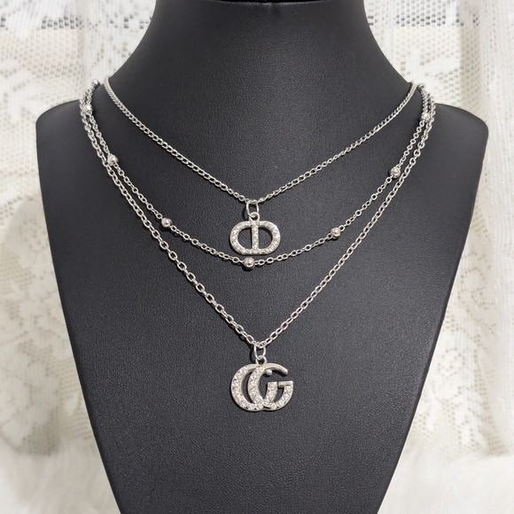 Jewelry - Elegant Silver Triple Layer Necklace with Crystal Details